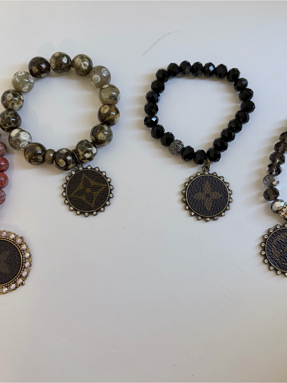 Beaded Bracelet with Logo Medallion